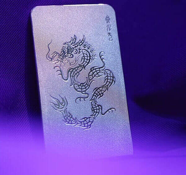 design of the 1 kg Fish Transforming into a Dragon platinum bar